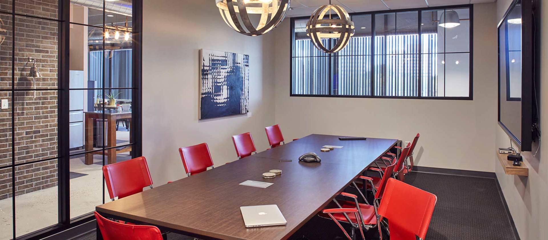 conference room with red chairs 